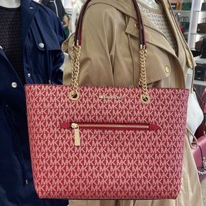 Michael Kors Jet Set Metallic Logo Chain Tote Bag
Chili/Pale Gold